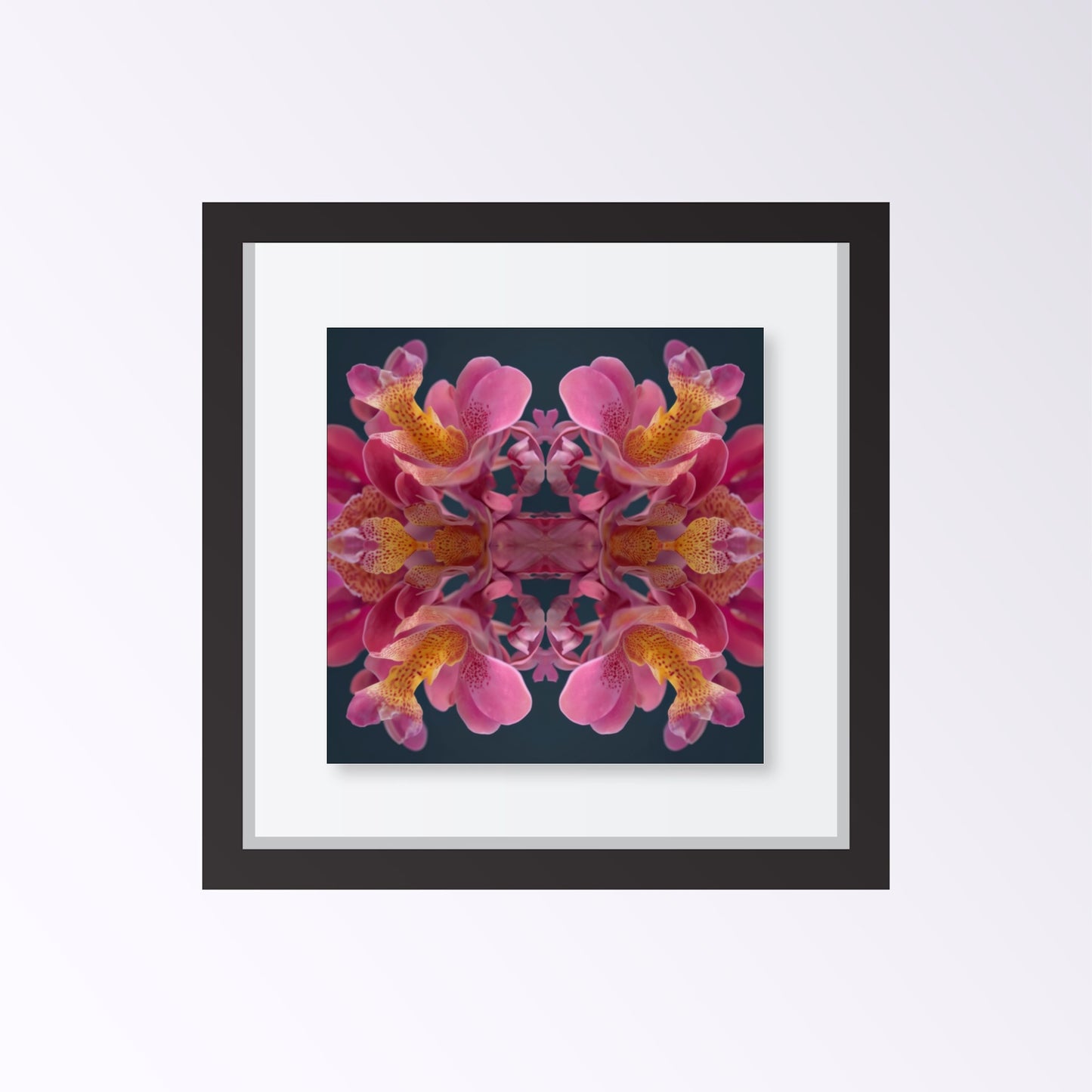 Pink Orchid Reflection print – lush magenta orchid blossoms mirrored in bold symmetry, tropical floral art framed black