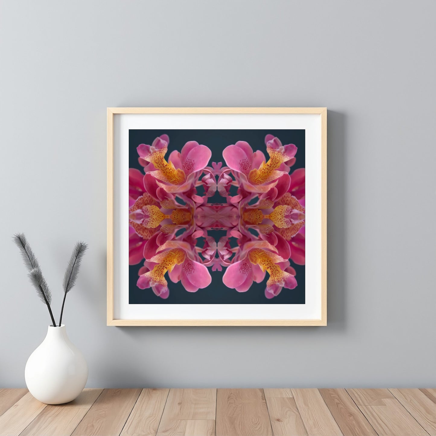 Pink Orchid Reflection print – lush magenta orchid blossoms mirrored in bold symmetry, tropical floral art framed black