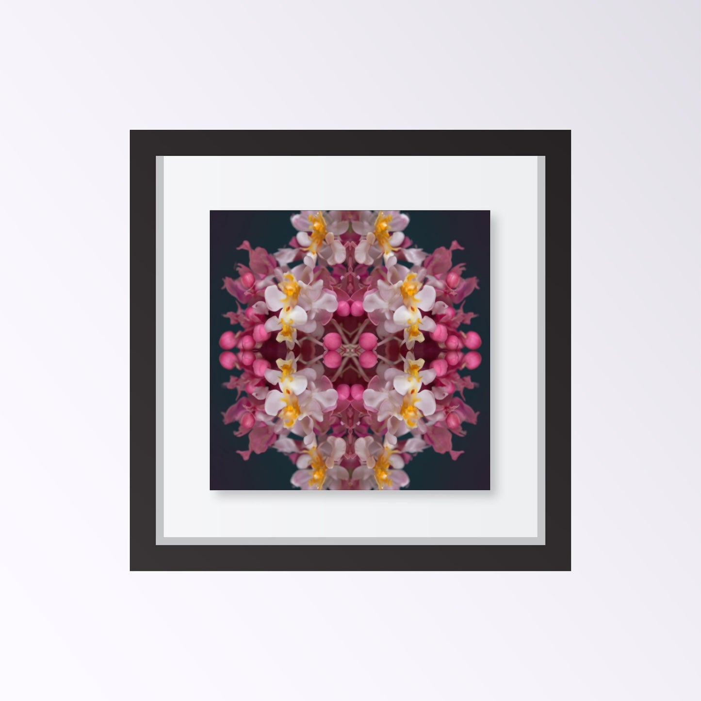 Orchid Haze wall art – soft pink and yellow orchids blurred in dreamy symmetry, elegant floral print framed black