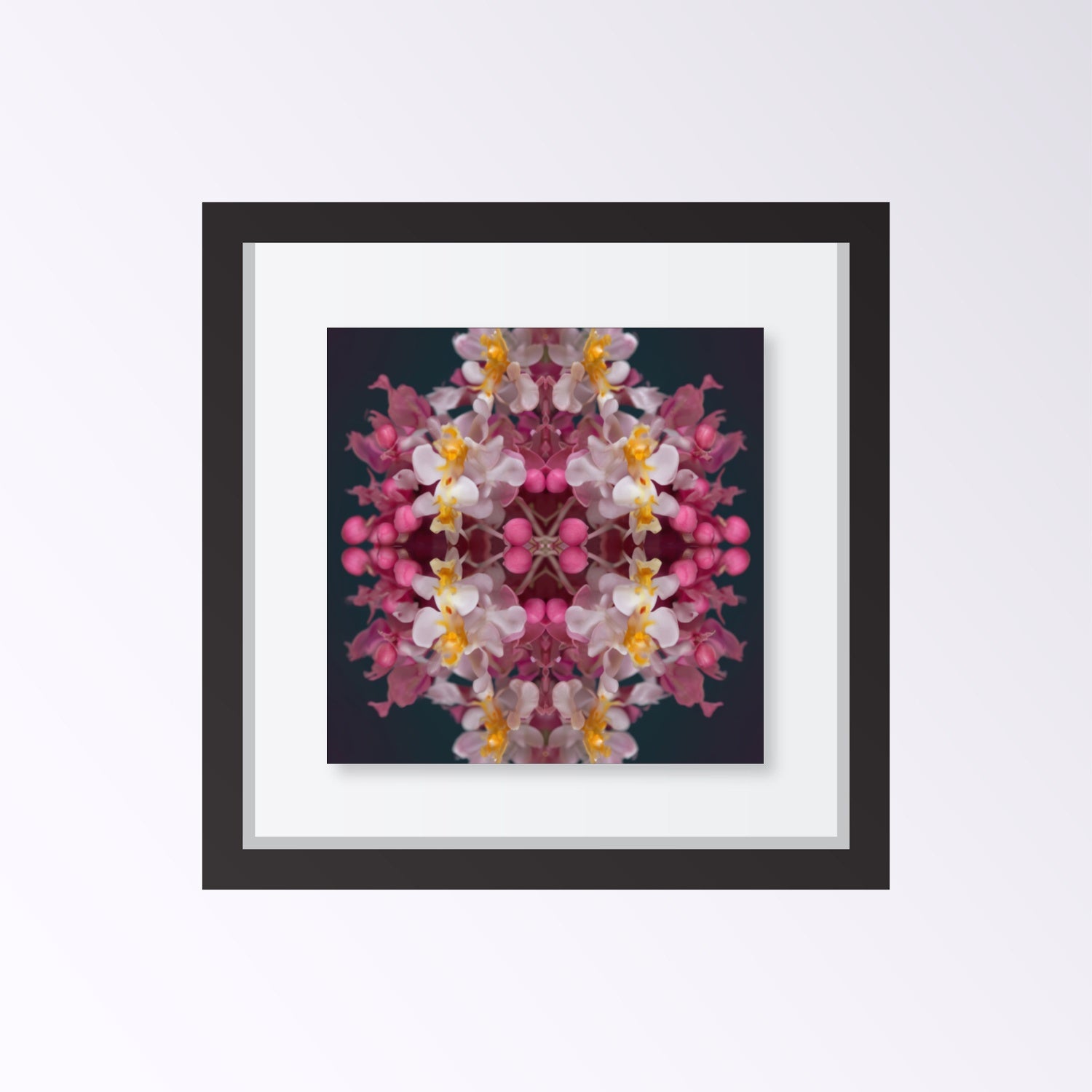 Orchid Haze wall art – soft pink and yellow orchids blurred in dreamy symmetry, elegant floral print framed black