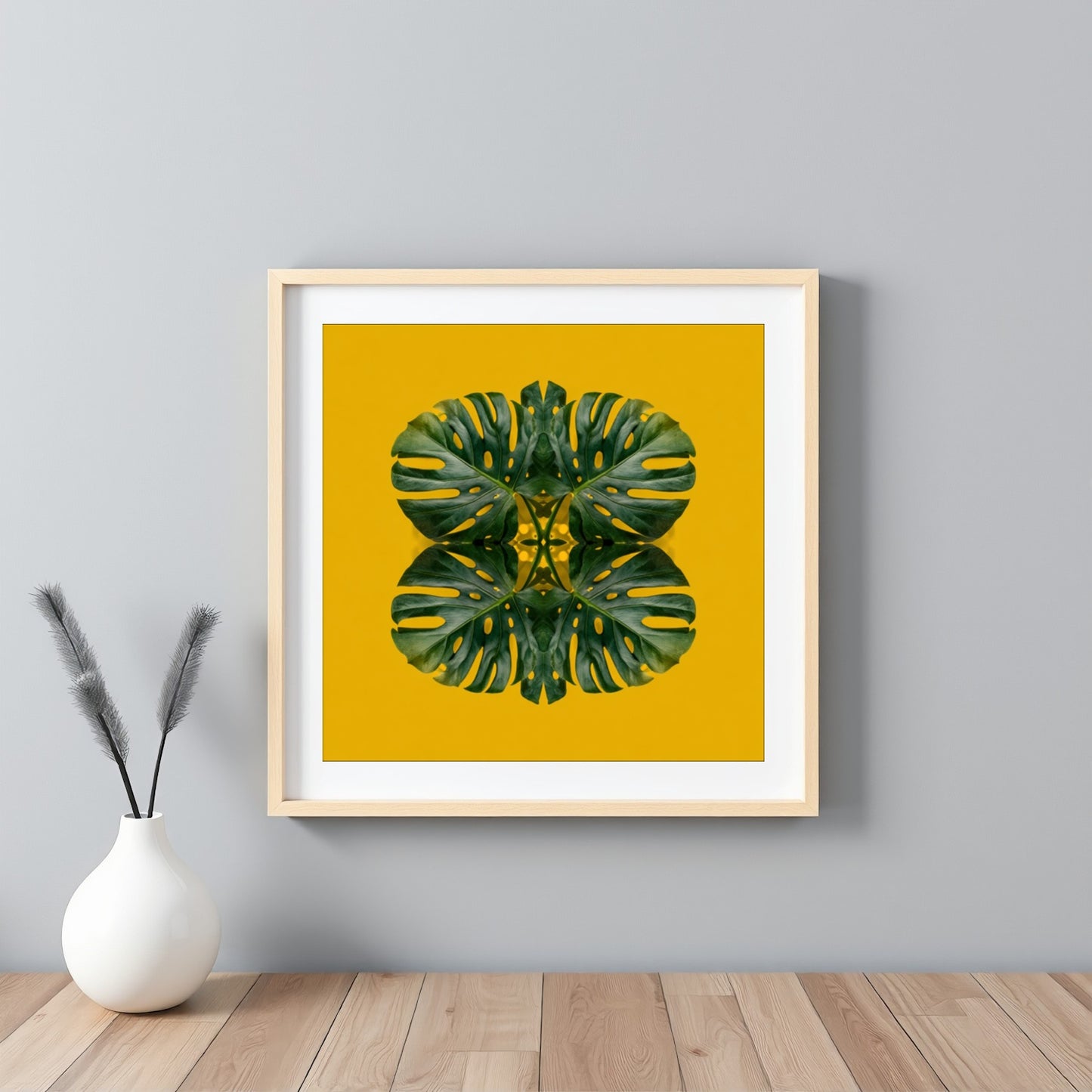 Monstera Jungle art print –yellow backdrop with green mirrored leaves, energizing tropical decor artwork framed white
